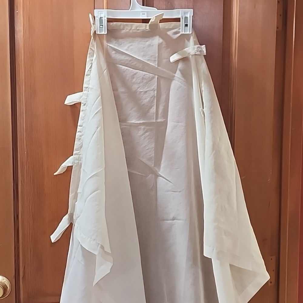 4 Sheer tan curtain panels with button loop top